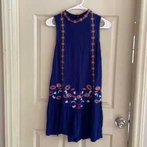 Cute Xhilaration bright blue dress with embroidered accents.